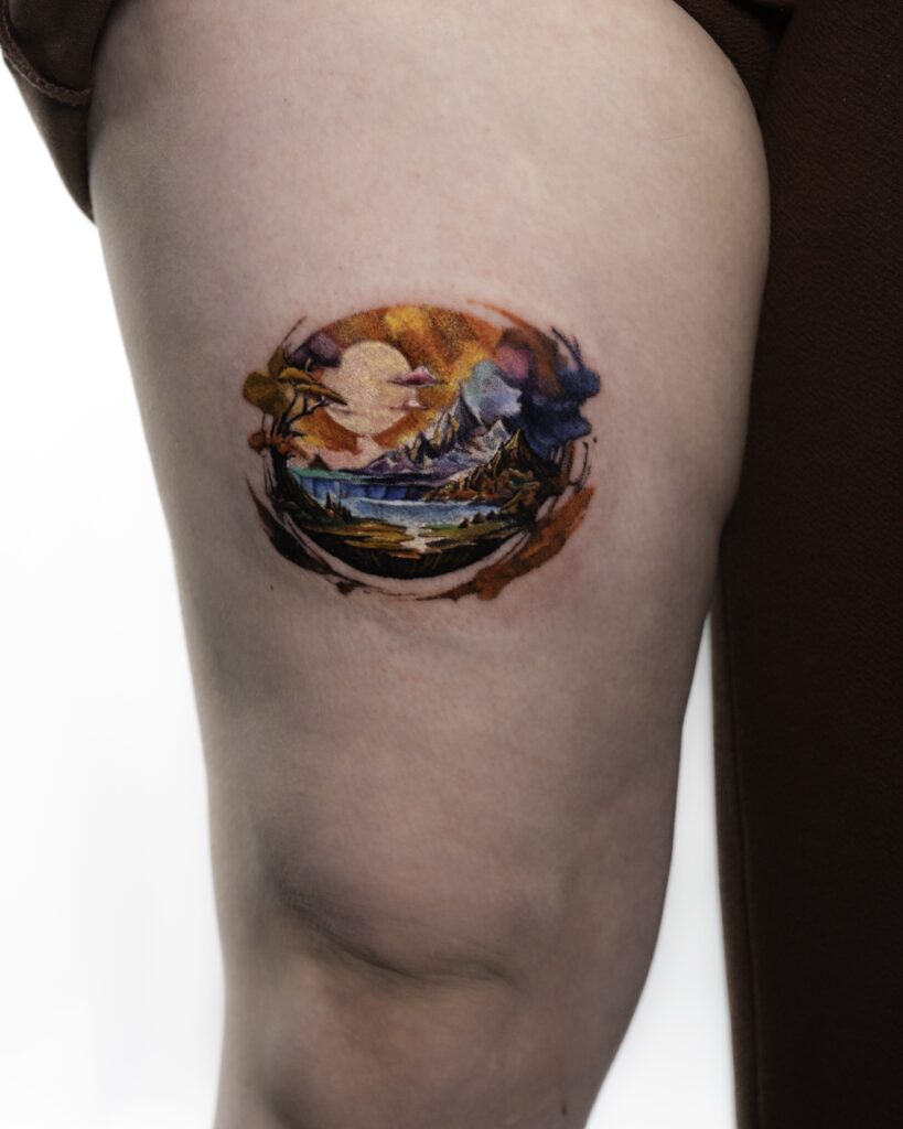 A sunset view tattoo in microrealism style, with vibrant colors.